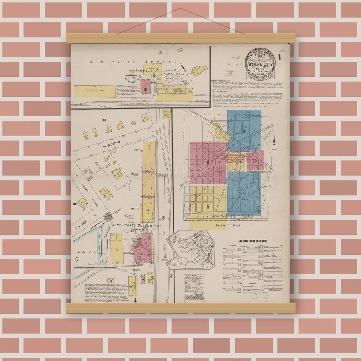 Old map wall art mockup — magnetic wood frame on brick wall — Sanborn Fire Insurance Map from Wolfe City, Hunt County, Texas (1922) - Complete Map Set