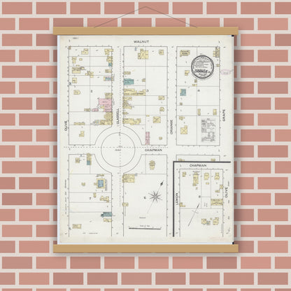 Old map wall art mockup — magnetic wood frame on brick wall — Sanborn Fire Insurance Map from Orange, Orange County, California (1887), Sheet #0001