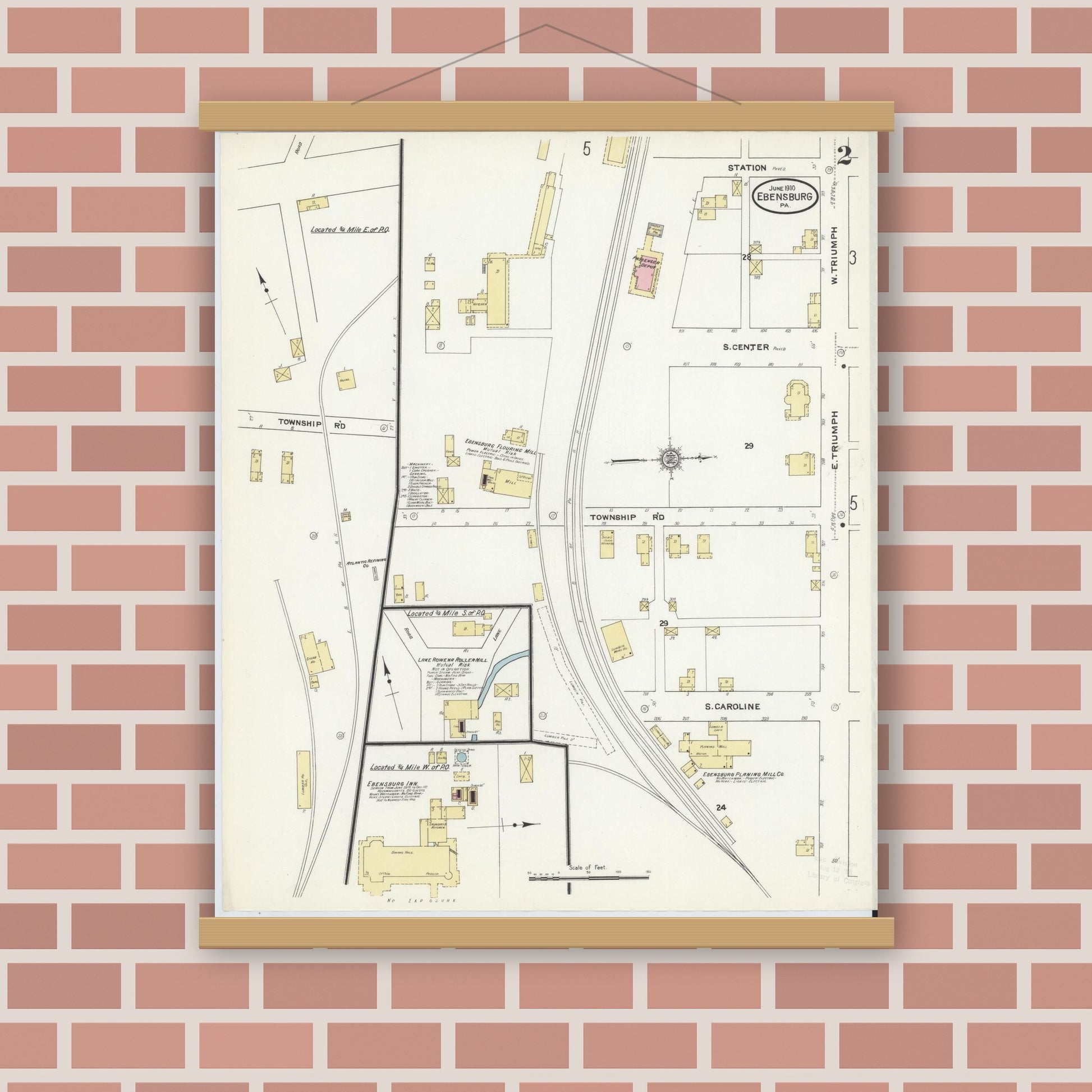 Old map wall art mockup — magnetic wood frame on brick wall — Sanborn Fire Insurance Map from Ebensburg, Cambria County, Pennsylvania (1910), Sheet #0002