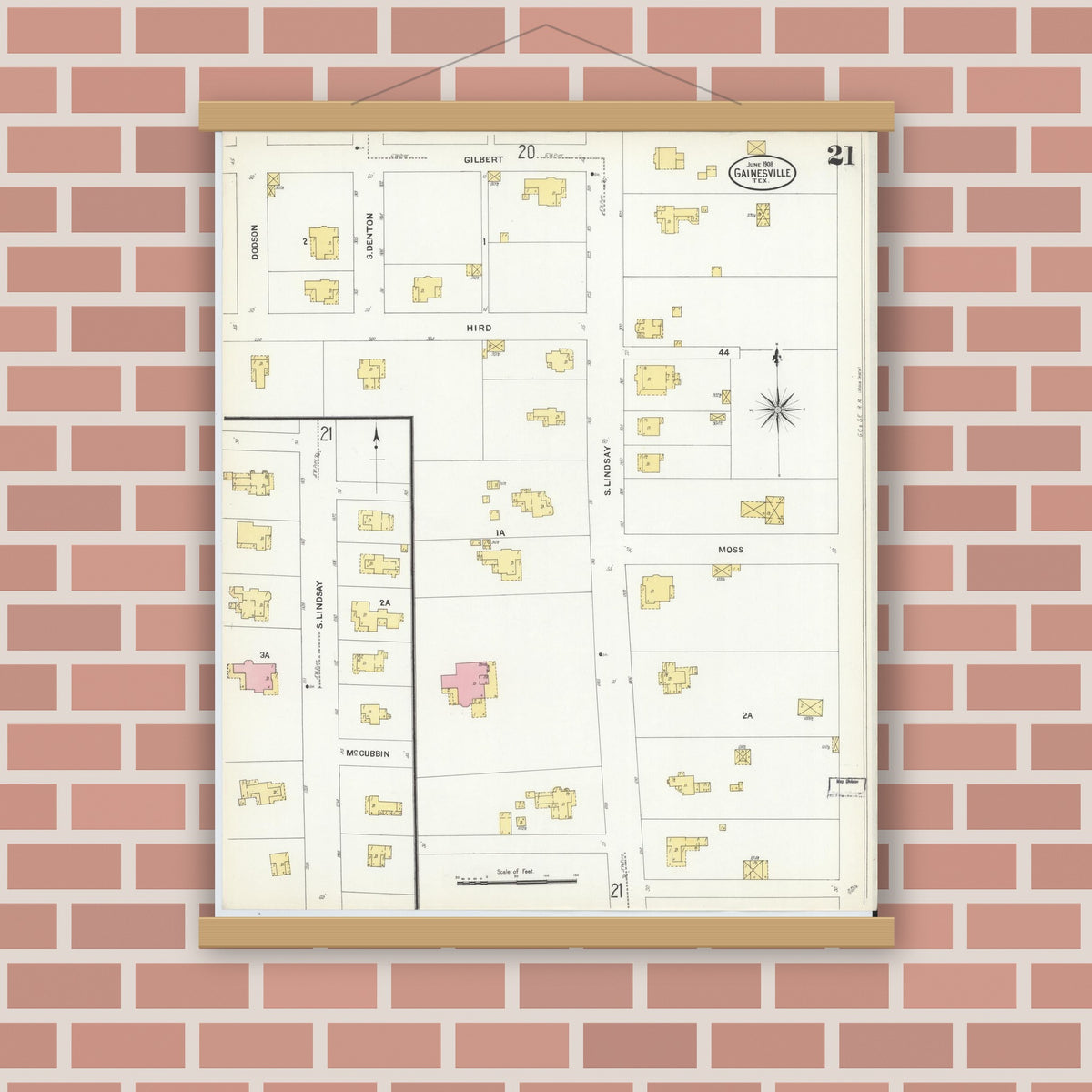 Old map wall art mockup — magnetic wood frame on brick wall — Sanborn Fire Insurance Map from Gainesville, Cooke County, Texas (1908), Sheet #0021