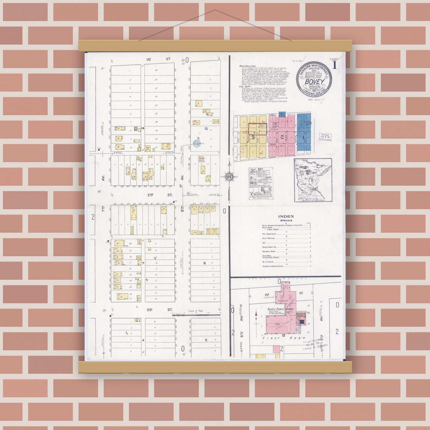 Old map wall art mockup — magnetic wood frame on brick wall — Sanborn Fire Insurance Map from Bovey, Itasca County, Minnesota (1921), Sheet #0001