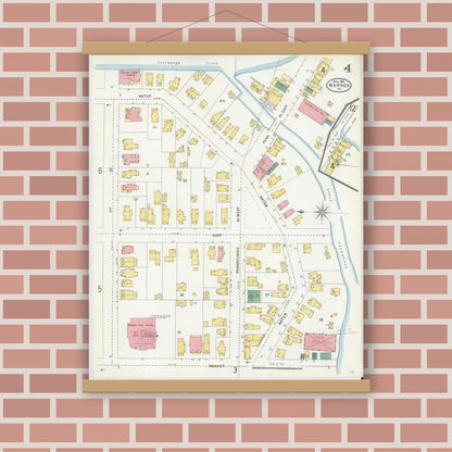 Old map wall art mockup — magnetic wood frame on brick wall — Sanborn Fire Insurance Map from Warren, Warren County, Pennsylvania (1904), Sheet #0004