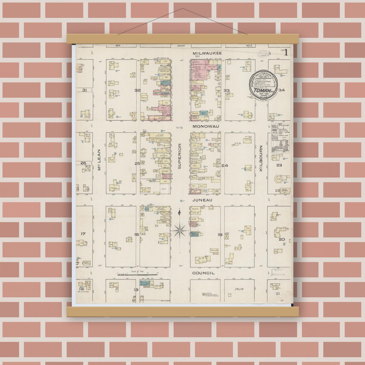 Old map wall art mockup — magnetic wood frame on brick wall — Sanborn Fire Insurance Map from Tomah, Monroe County, Wisconsin (1885), Sheet #0001