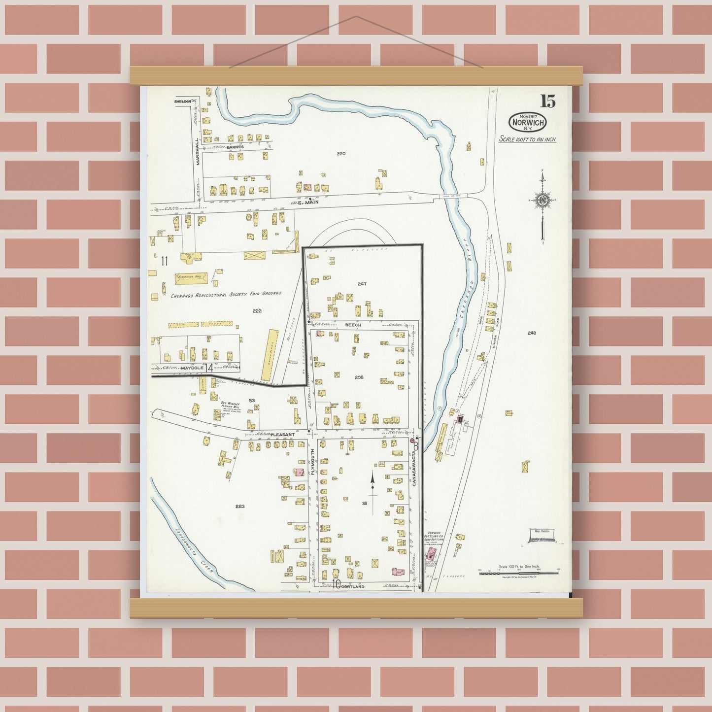 Old map wall art mockup — magnetic wood frame on brick wall — Sanborn Fire Insurance Map from Norwich, Chenango County, New York (1917), Sheet #0015
