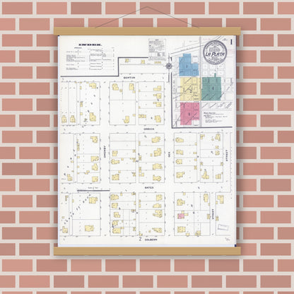 Old map wall art mockup — magnetic wood frame on brick wall — Sanborn Fire Insurance Map from La Plata, Macon County, Missouri (1909) - Complete Map Set