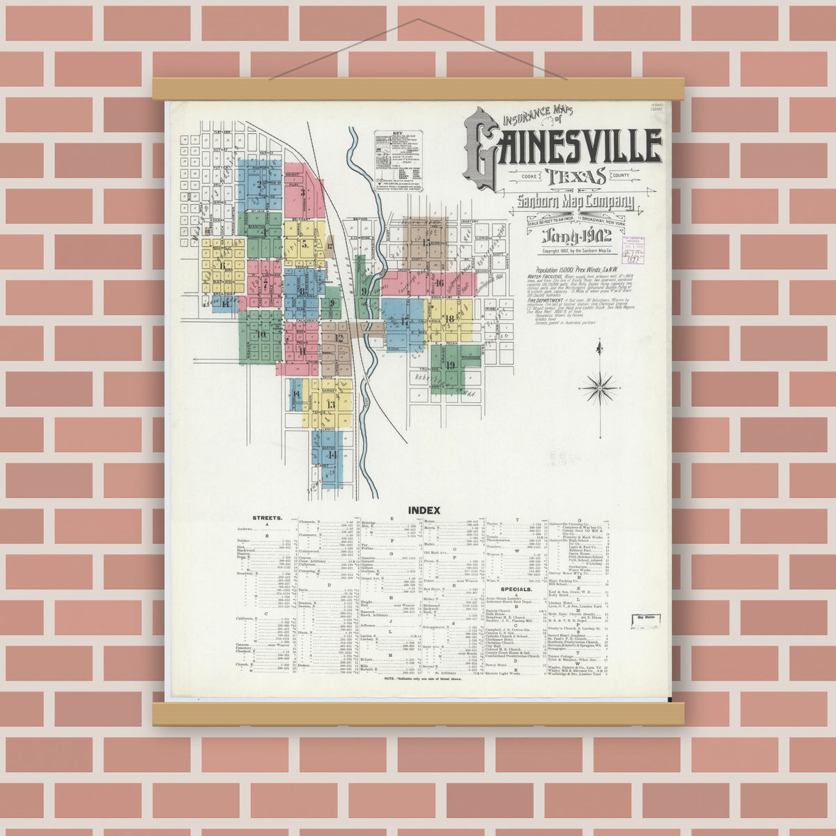 Old map wall art mockup — magnetic wood frame on brick wall — Sanborn Fire Insurance Map from Gainesville, Cooke County, Texas (1902), Sheet #0001