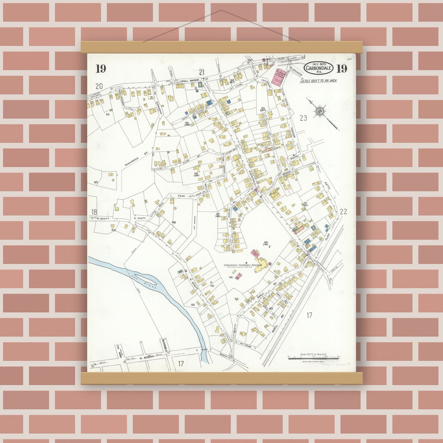 Old map wall art mockup — magnetic wood frame on brick wall — Sanborn Fire Insurance Map from Carbondale, Lackawanna County, Pennsylvania (1923), Sheet #0019