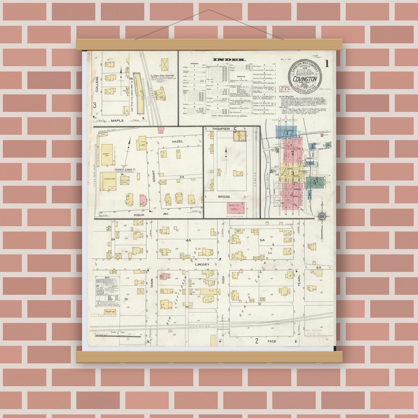 Old map wall art mockup — magnetic wood frame on brick wall — Sanborn Fire Insurance Map from Covington, Miami County, Ohio (1910), Sheet #0001