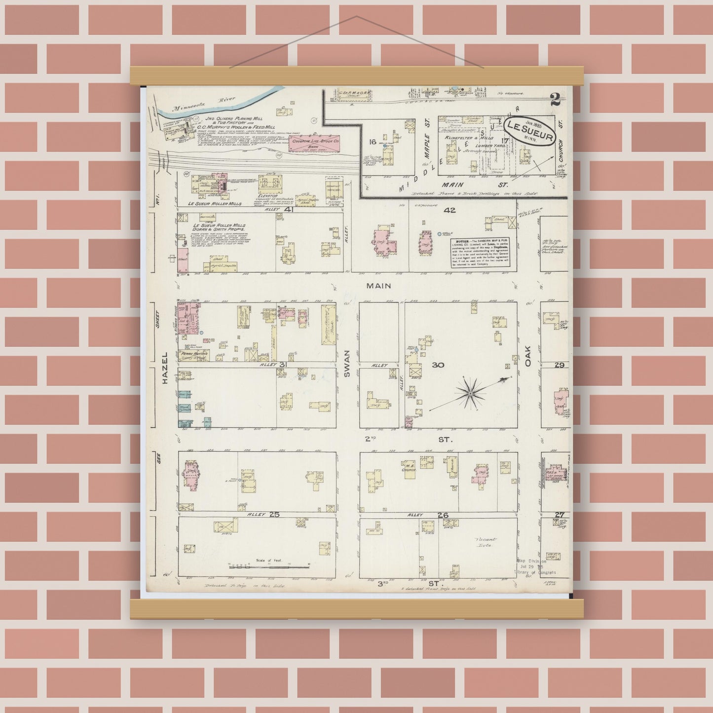 Old map wall art mockup — magnetic wood frame on brick wall — Sanborn Fire Insurance Map from Le Sueur, Le Sueur County, Minnesota (1885), Sheet #0002