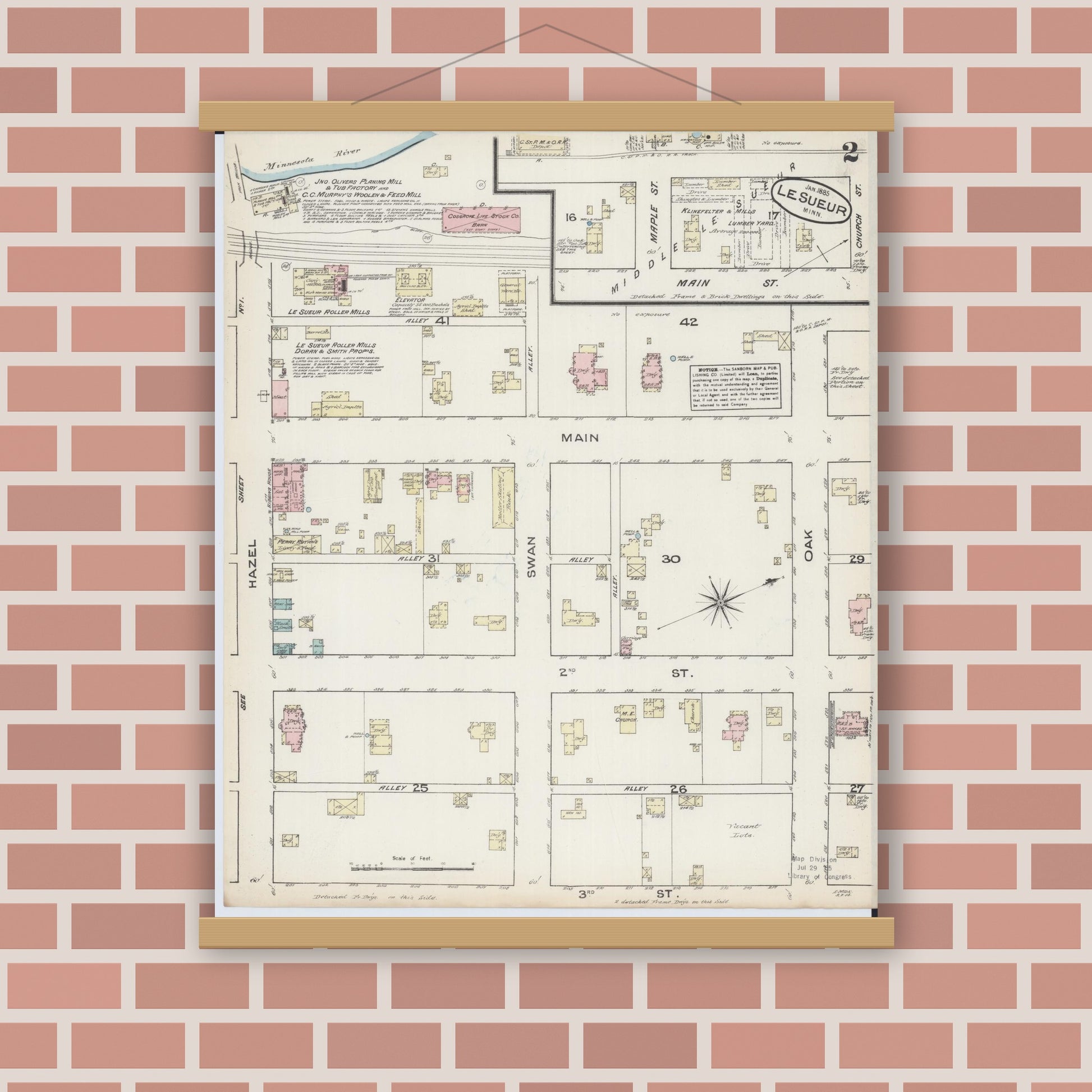 Old map wall art mockup — magnetic wood frame on brick wall — Sanborn Fire Insurance Map from Le Sueur, Le Sueur County, Minnesota (1885), Sheet #0002
