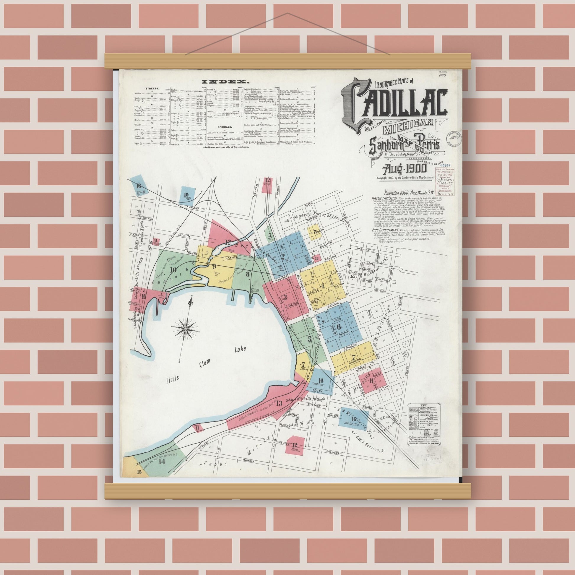 Old map wall art mockup — magnetic wood frame on brick wall — Sanborn Fire Insurance Map from Cadillac, Wexford County, Michigan (1900) - Complete Map Set