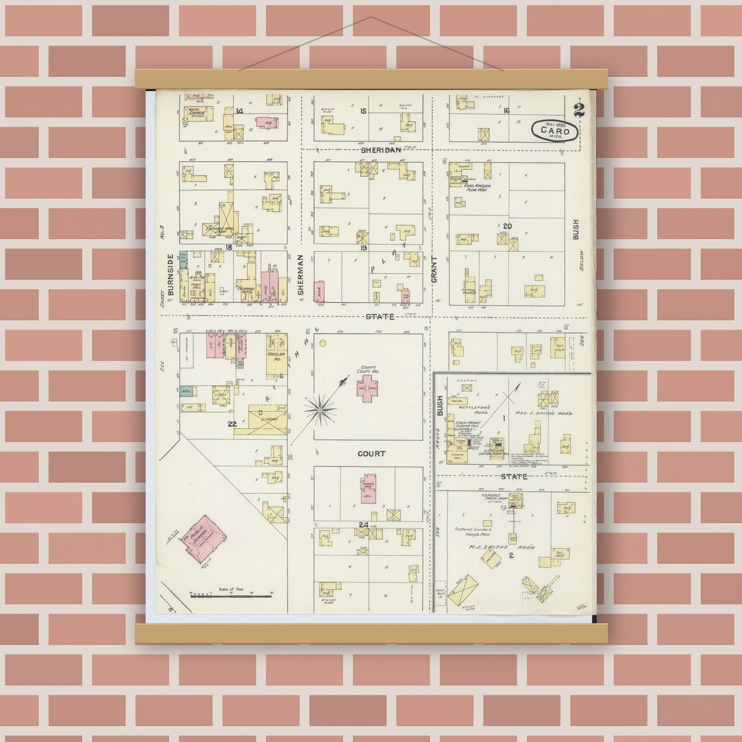 Old map wall art mockup — magnetic wood frame on brick wall — Sanborn Fire Insurance Map from Caro, Tuscola County, Michigan (1890), Sheet #0002