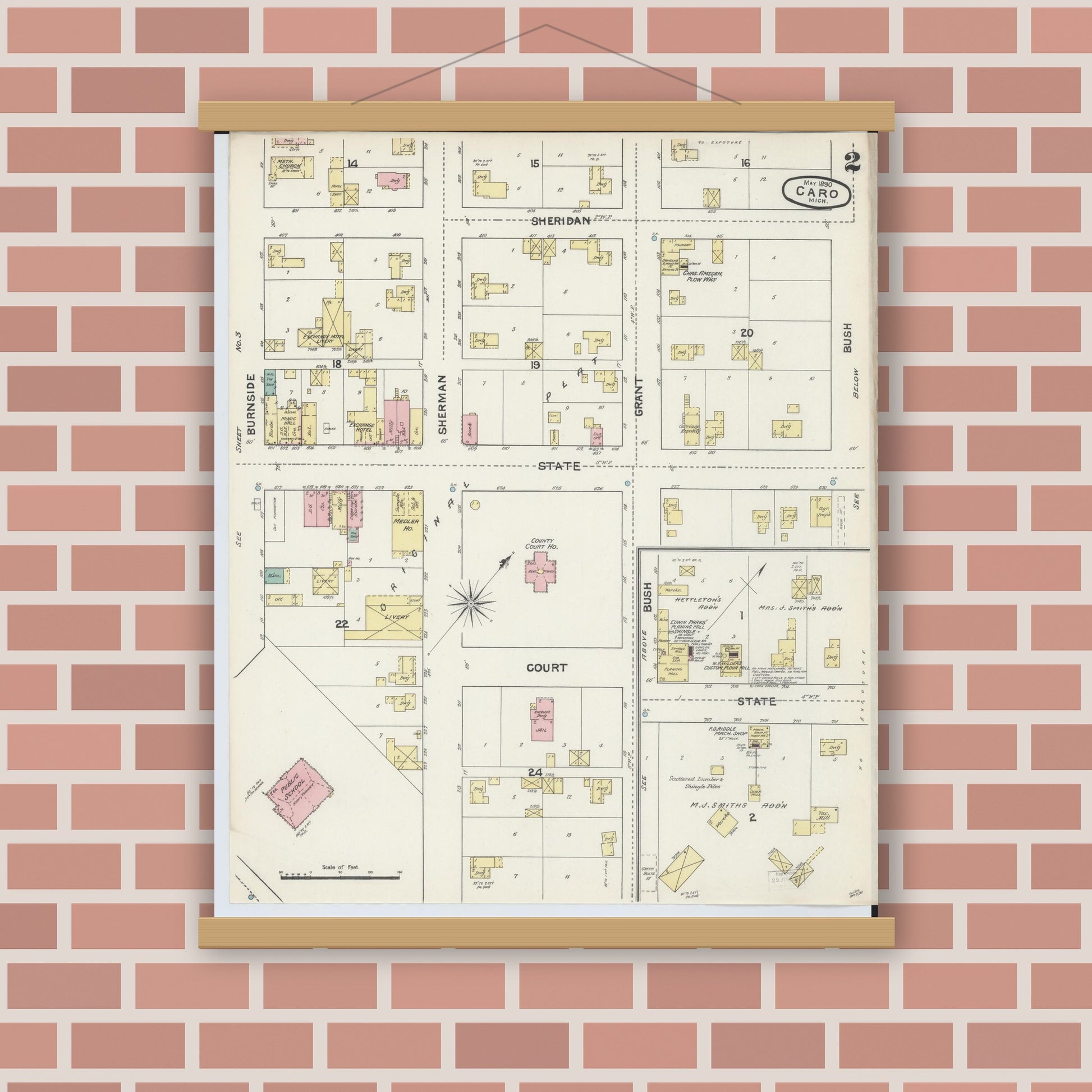 Old map wall art mockup — magnetic wood frame on brick wall — Sanborn Fire Insurance Map from Caro, Tuscola County, Michigan (1890), Sheet #0002