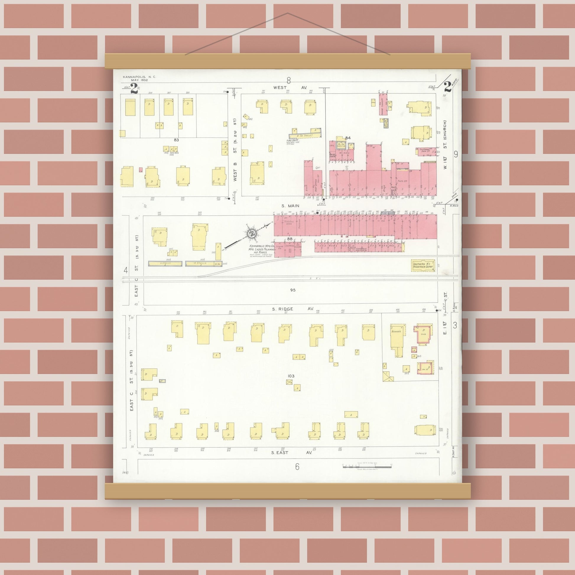 Old map wall art mockup — magnetic wood frame on brick wall — Sanborn Fire Insurance Map from Kannapolis, Rowan And Cabarrus Counties, North Carolina (1932), Sheet #0002