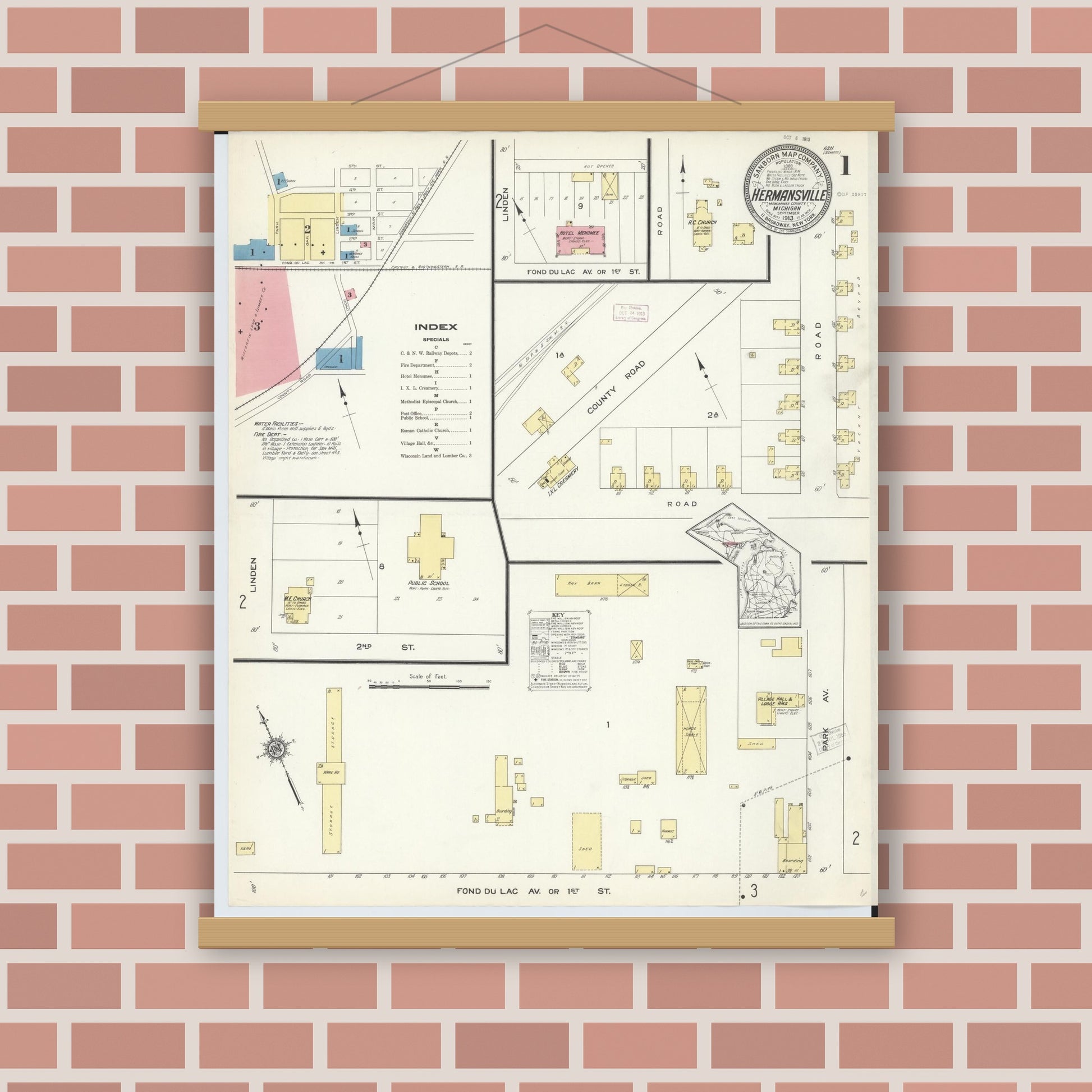 Old map wall art mockup — magnetic wood frame on brick wall — Sanborn Fire Insurance Map from Hermansville, Menominee County, Michigan (1913) - Complete Map Set