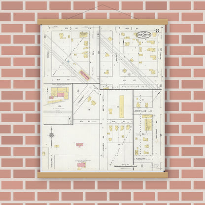 Old map wall art mockup — magnetic wood frame on brick wall — Sanborn Fire Insurance Map from Sauk Centre, Stearns County, Minnesota (1916), Sheet #0008