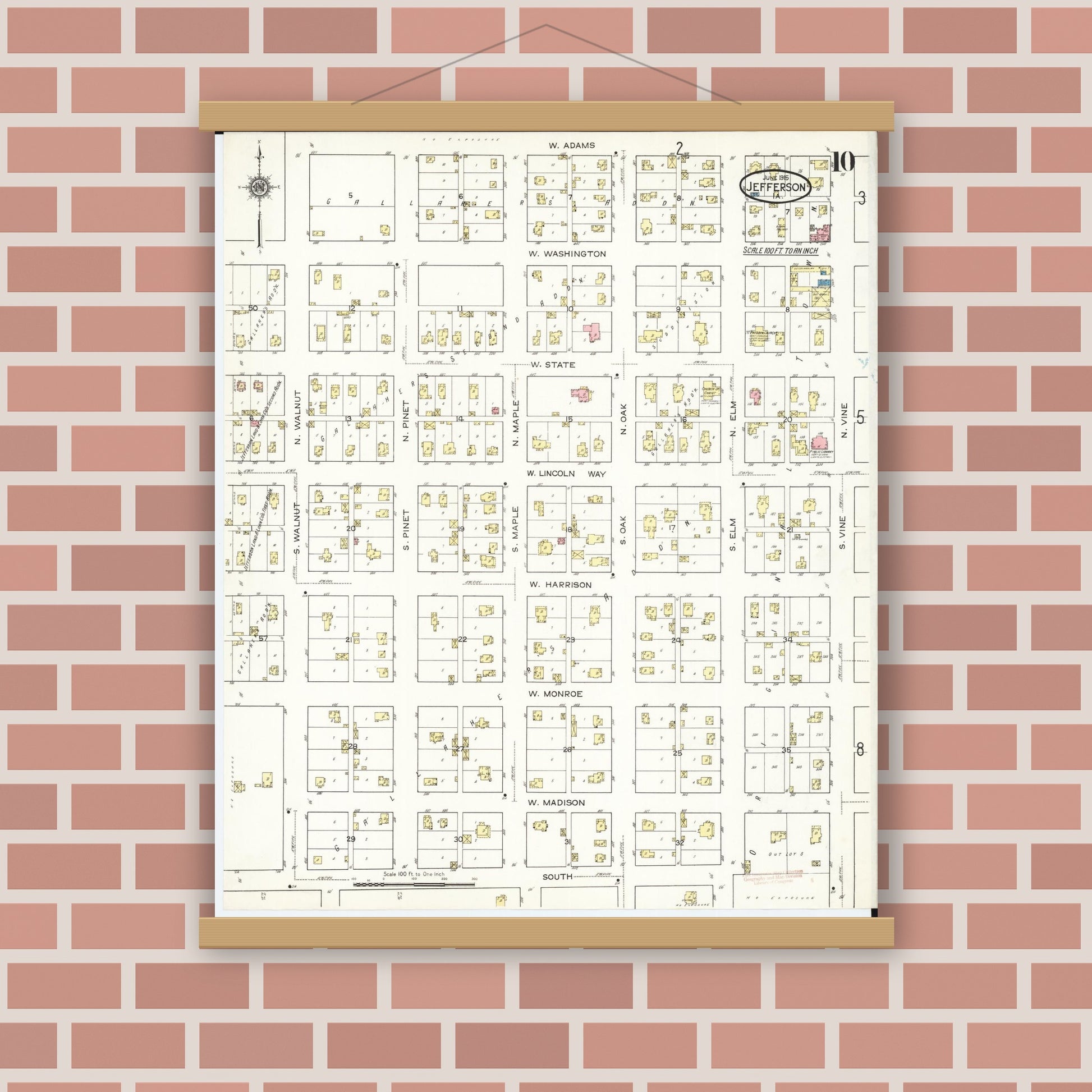 Old map wall art mockup — magnetic wood frame on brick wall — Sanborn Fire Insurance Map from Jefferson, Greene County, Iowa (1915), Sheet #0010