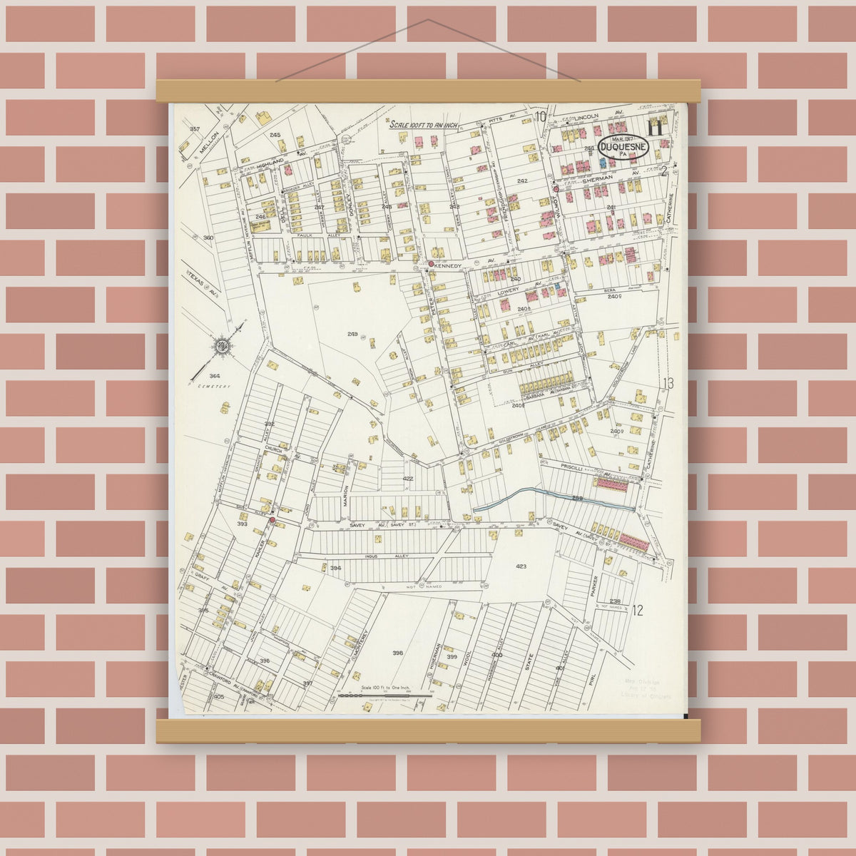 Old map wall art mockup — magnetic wood frame on brick wall — Sanborn Fire Insurance Map from Duquesne, Allegheny County, Pennsylvania (1917), Sheet #0011