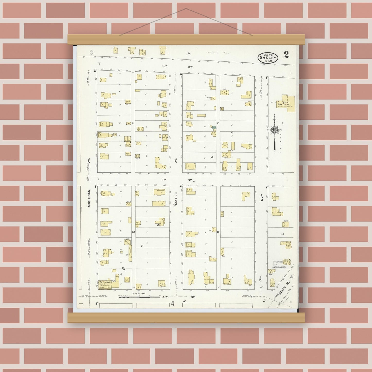 Old map wall art mockup — magnetic wood frame on brick wall — Sanborn Fire Insurance Map from Shelby, Oceana County, Michigan (1910), Sheet #0002