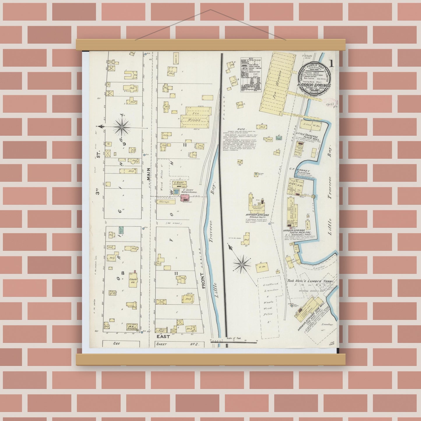 Old map wall art mockup — magnetic wood frame on brick wall — Sanborn Fire Insurance Map from Harbor Springs, Emmet County, Michigan (1890) - Complete Map Set