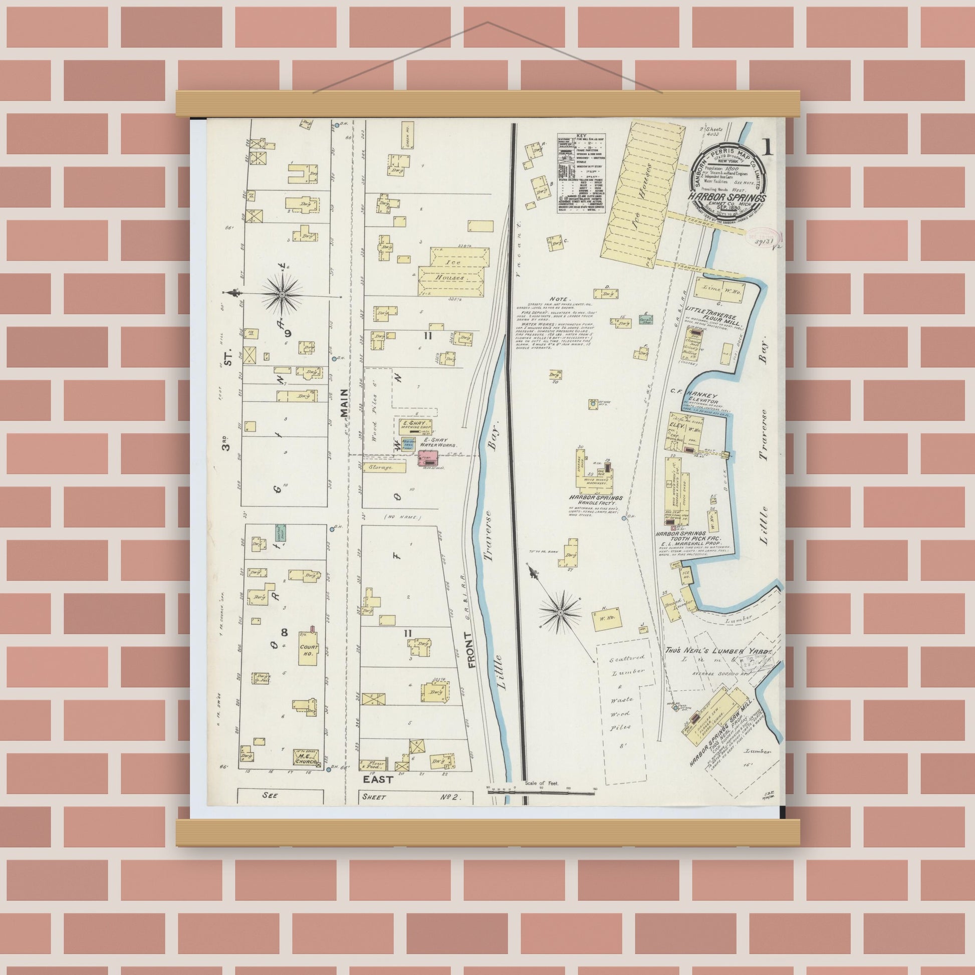 Old map wall art mockup — magnetic wood frame on brick wall — Sanborn Fire Insurance Map from Harbor Springs, Emmet County, Michigan (1890) - Complete Map Set