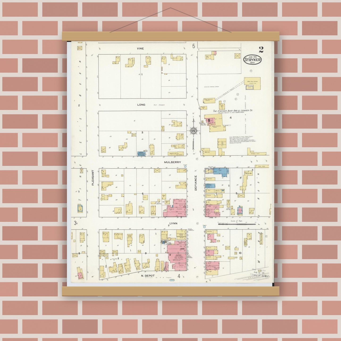 Old map wall art mockup — magnetic wood frame on brick wall — Sanborn Fire Insurance Map from Stryker, Williams County, Ohio (1916), Sheet #0002