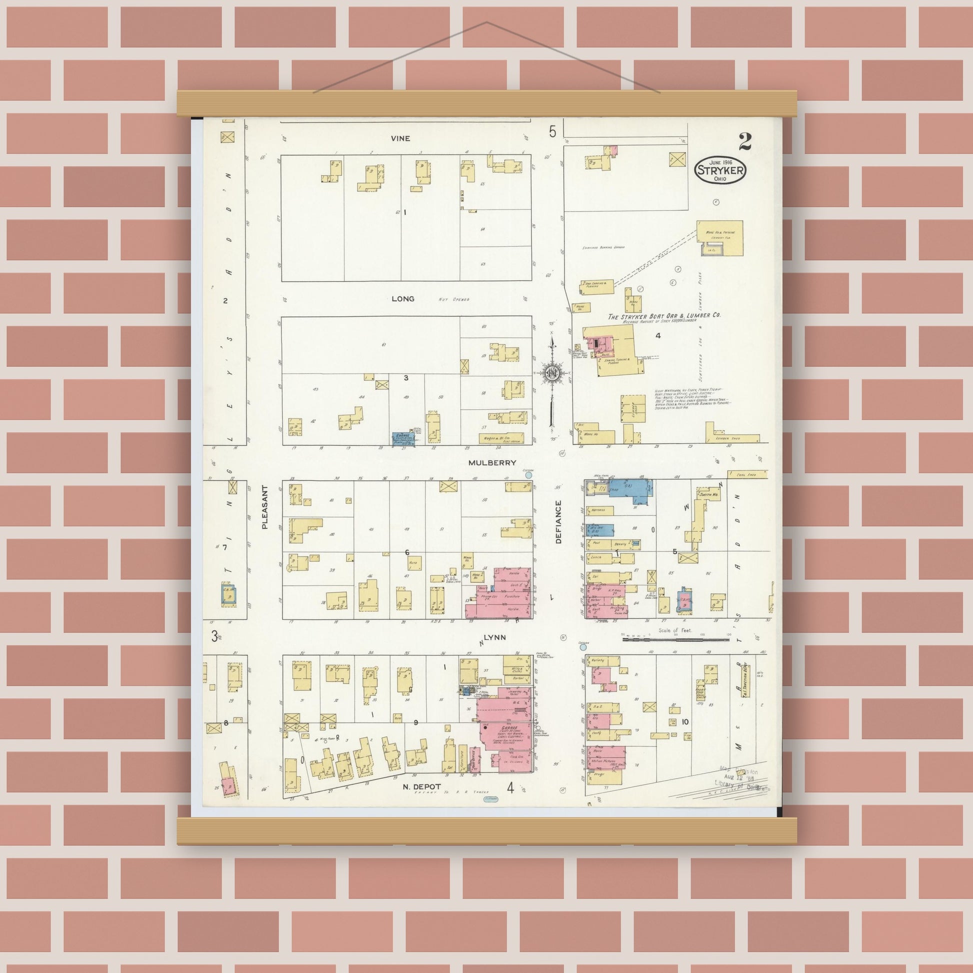 Old map wall art mockup — magnetic wood frame on brick wall — Sanborn Fire Insurance Map from Stryker, Williams County, Ohio (1916), Sheet #0002