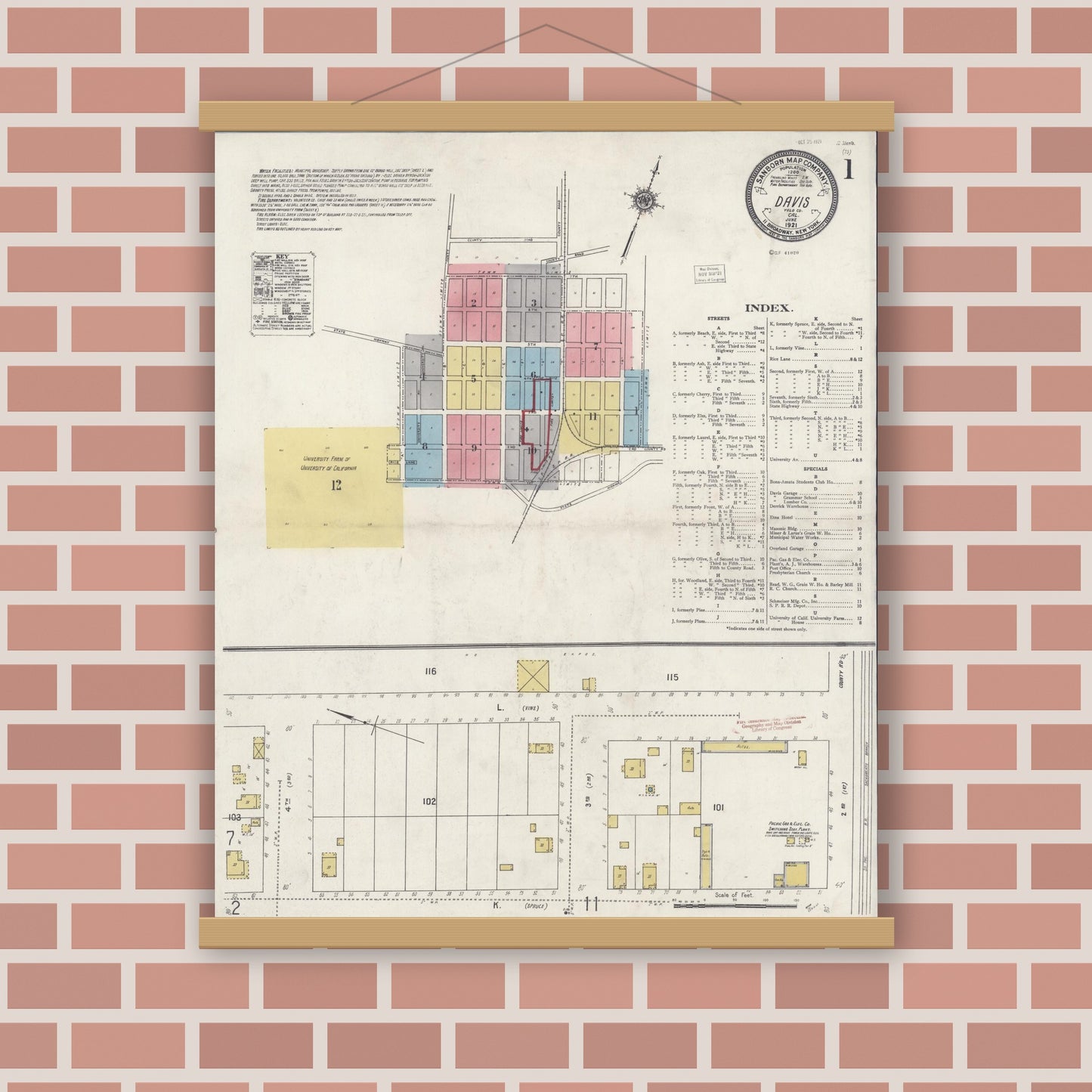 Old map wall art mockup — magnetic wood frame on brick wall — Sanborn Fire Insurance Map from Davis, Yolo County, California (1921), Sheet #0001