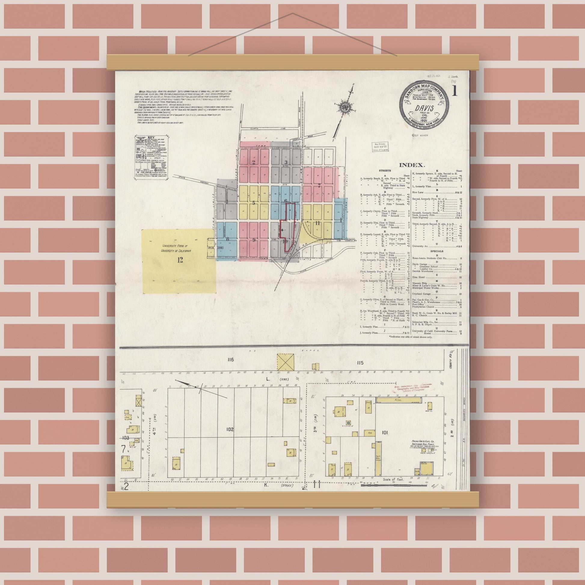 Old map wall art mockup — magnetic wood frame on brick wall — Sanborn Fire Insurance Map from Davis, Yolo County, California (1921), Sheet #0001