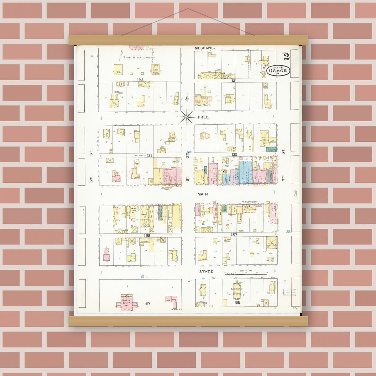 Old map wall art mockup — magnetic wood frame on brick wall — Sanborn Fire Insurance Map from Osage, Mitchell County, Iowa (1892), Sheet #0002