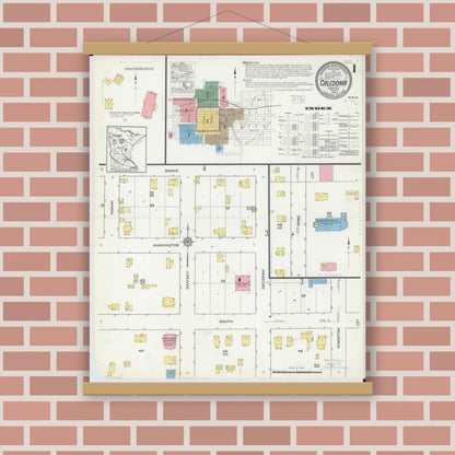 Old map wall art mockup — magnetic wood frame on brick wall — Sanborn Fire Insurance Map from Caledonia, Houston County, Minnesota (1915), Sheet #0001