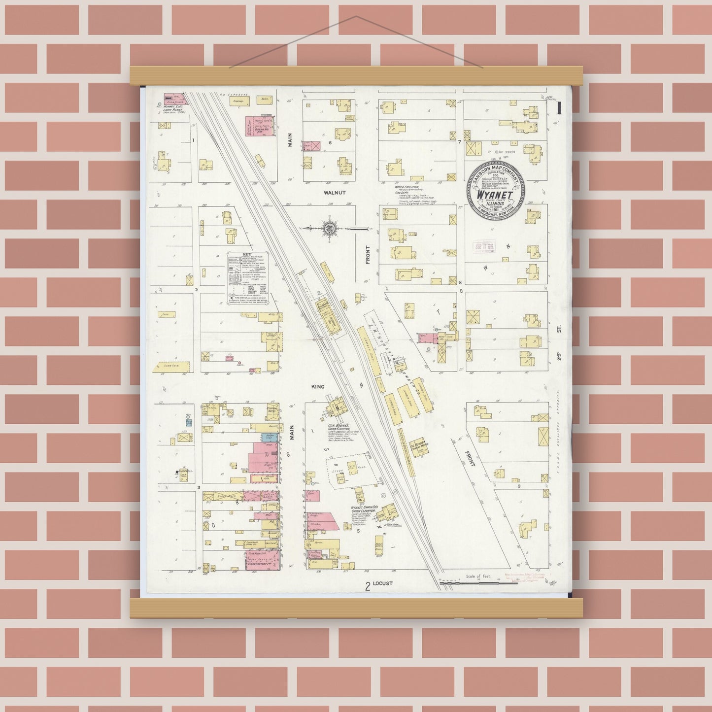 Old map wall art mockup — magnetic wood frame on brick wall — Sanborn Fire Insurance Map from Wyanet, Bureau County, Illinois (1911) - Complete Map Set