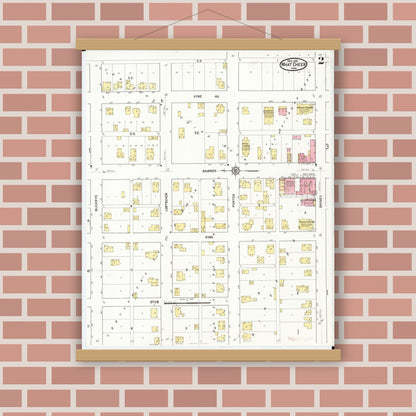 Old map wall art mockup — magnetic wood frame on brick wall — Sanborn Fire Insurance Map from What Cheer, Keokuk County, Iowa (1916), Sheet #0002