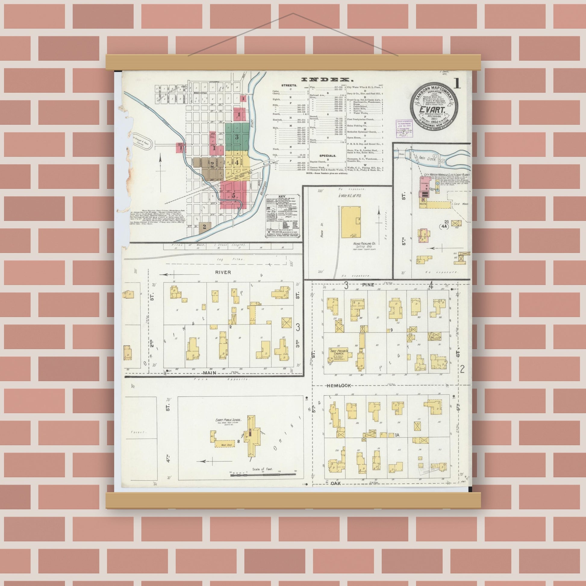Old map wall art mockup — magnetic wood frame on brick wall — Sanborn Fire Insurance Map from Evart, Osceola County, Michigan (1904), Sheet #0001