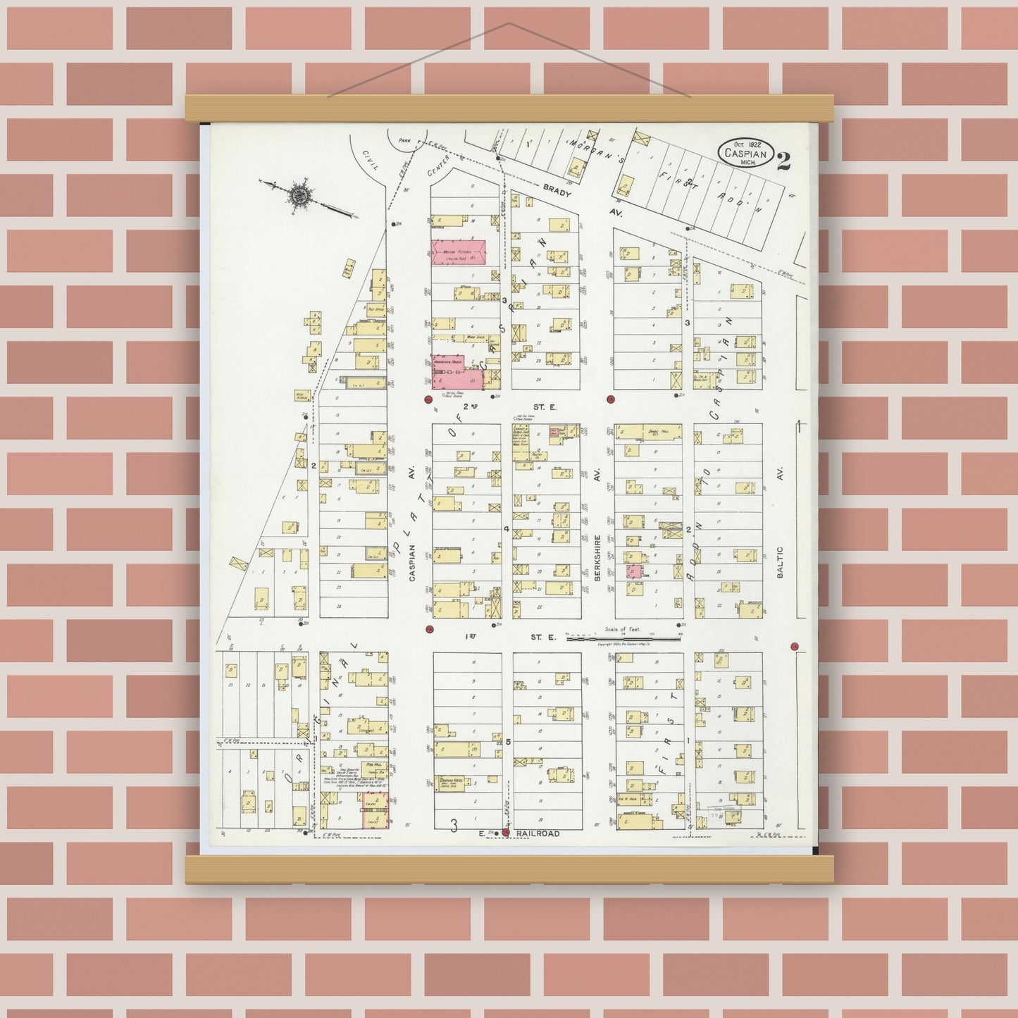 Old map wall art mockup — magnetic wood frame on brick wall — Sanborn Fire Insurance Map from Caspian, Iron County, Michigan (1922), Sheet #0002