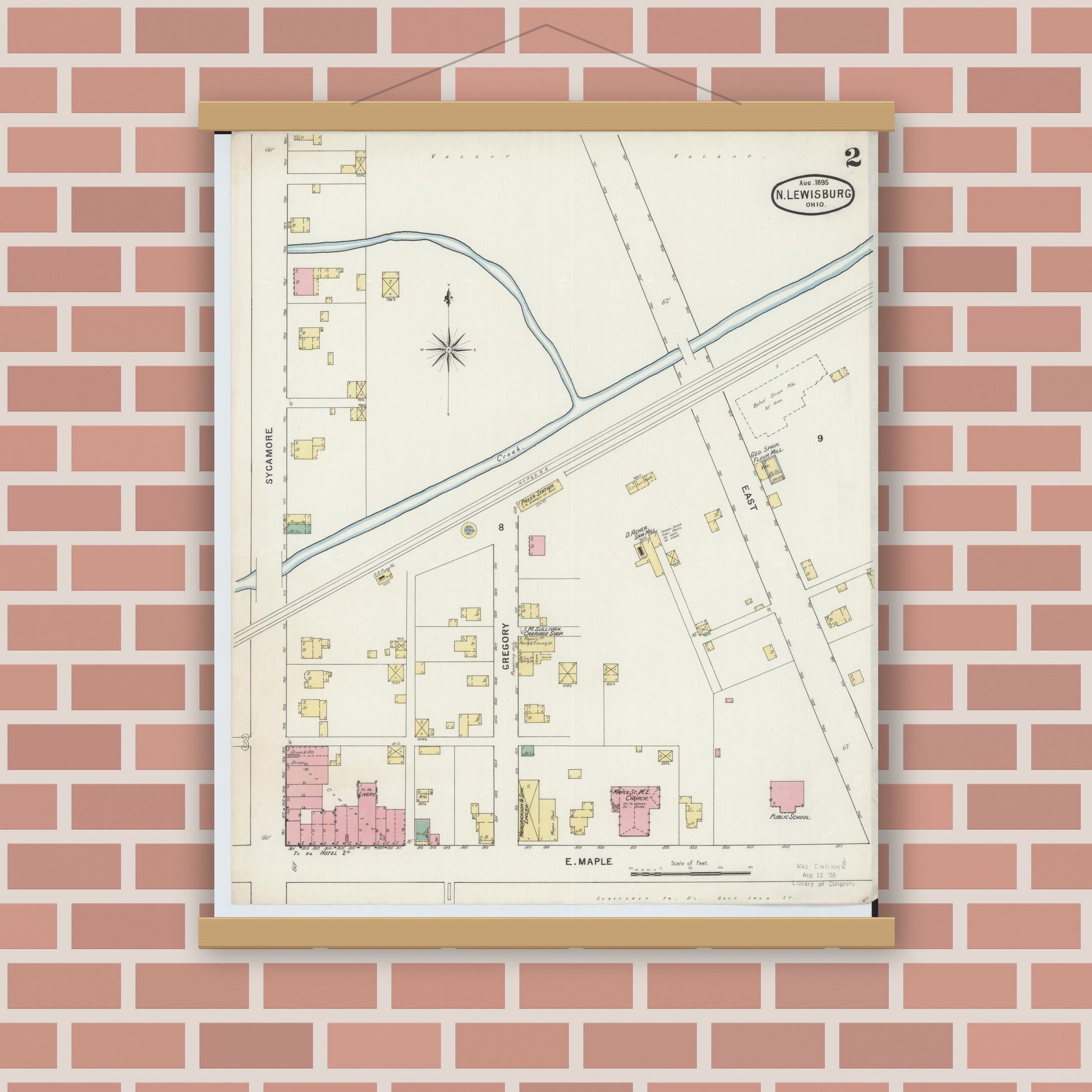 Old map wall art mockup — magnetic wood frame on brick wall — Sanborn Fire Insurance Map from North Lewisburg, Champaign County, Ohio (1895), Sheet #0002