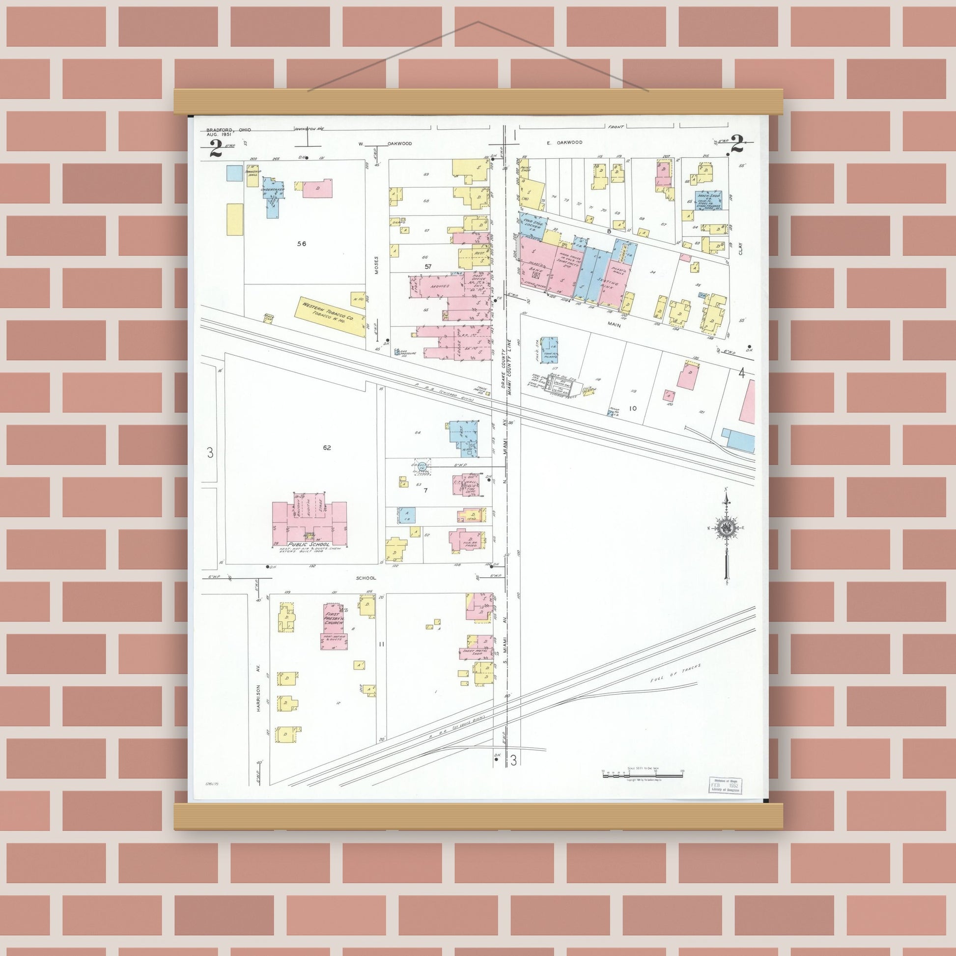 Old map wall art mockup — magnetic wood frame on brick wall — Sanborn Fire Insurance Map from Bradford, Darke and Miami Counties, Ohio (1951), Sheet #0002