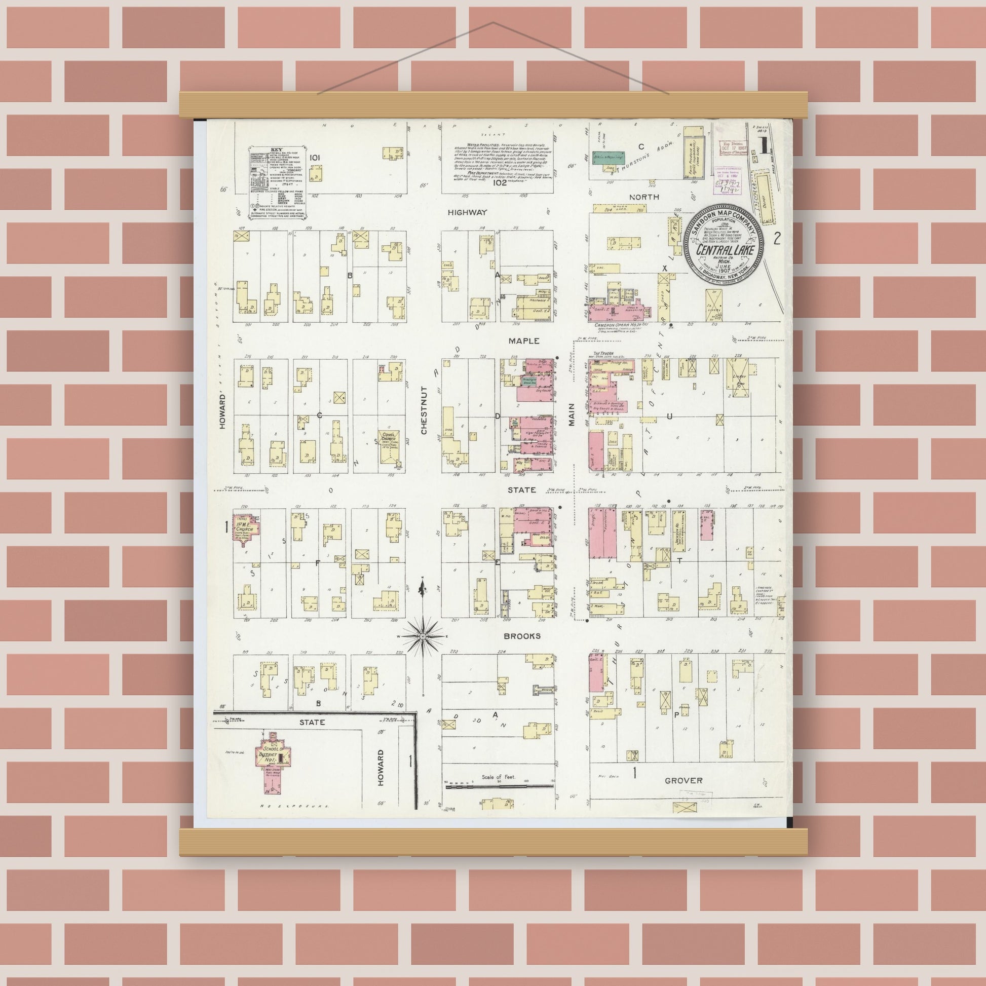Old map wall art mockup — magnetic wood frame on brick wall — Sanborn Fire Insurance Map from Central Lake, Antrim County, Michigan (1907) - Complete Map Set