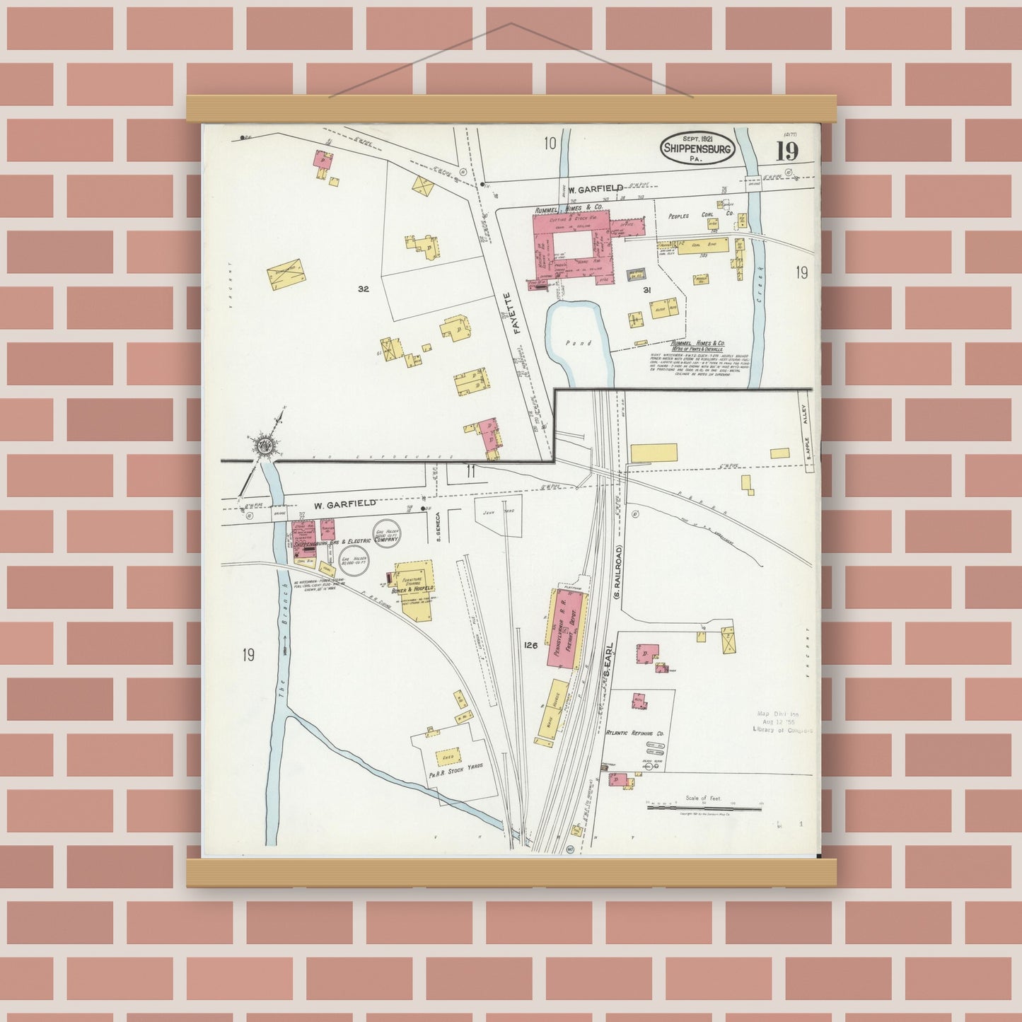Old map wall art mockup — magnetic wood frame on brick wall — Sanborn Fire Insurance Map from Shippensburg, Cumberland And Franklin Counties, Pennsylvania (1921), Sheet #0019