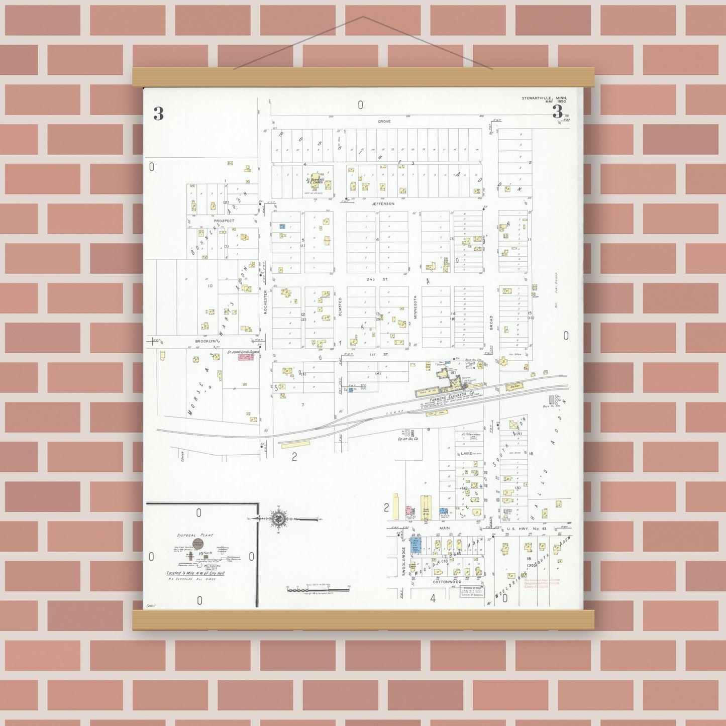 Old map wall art mockup — magnetic wood frame on brick wall — Sanborn Fire Insurance Map from Stewartville, Olmsted County, Minnesota (1950), Sheet #0003