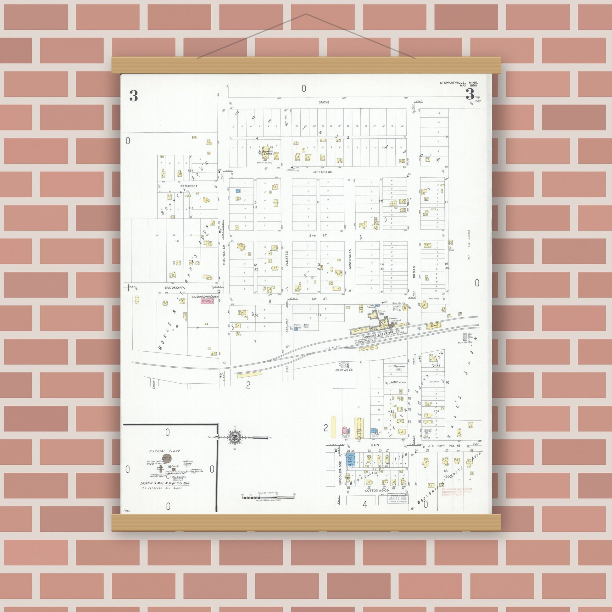 Old map wall art mockup — magnetic wood frame on brick wall — Sanborn Fire Insurance Map from Stewartville, Olmsted County, Minnesota (1950), Sheet #0003