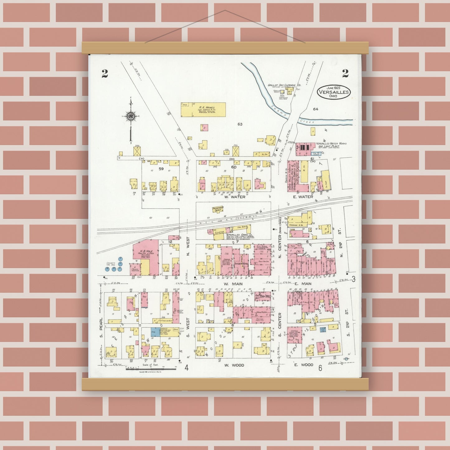 Old map wall art mockup — magnetic wood frame on brick wall — Sanborn Fire Insurance Map from Versailles, Darke County, Ohio (1925), Sheet #0002