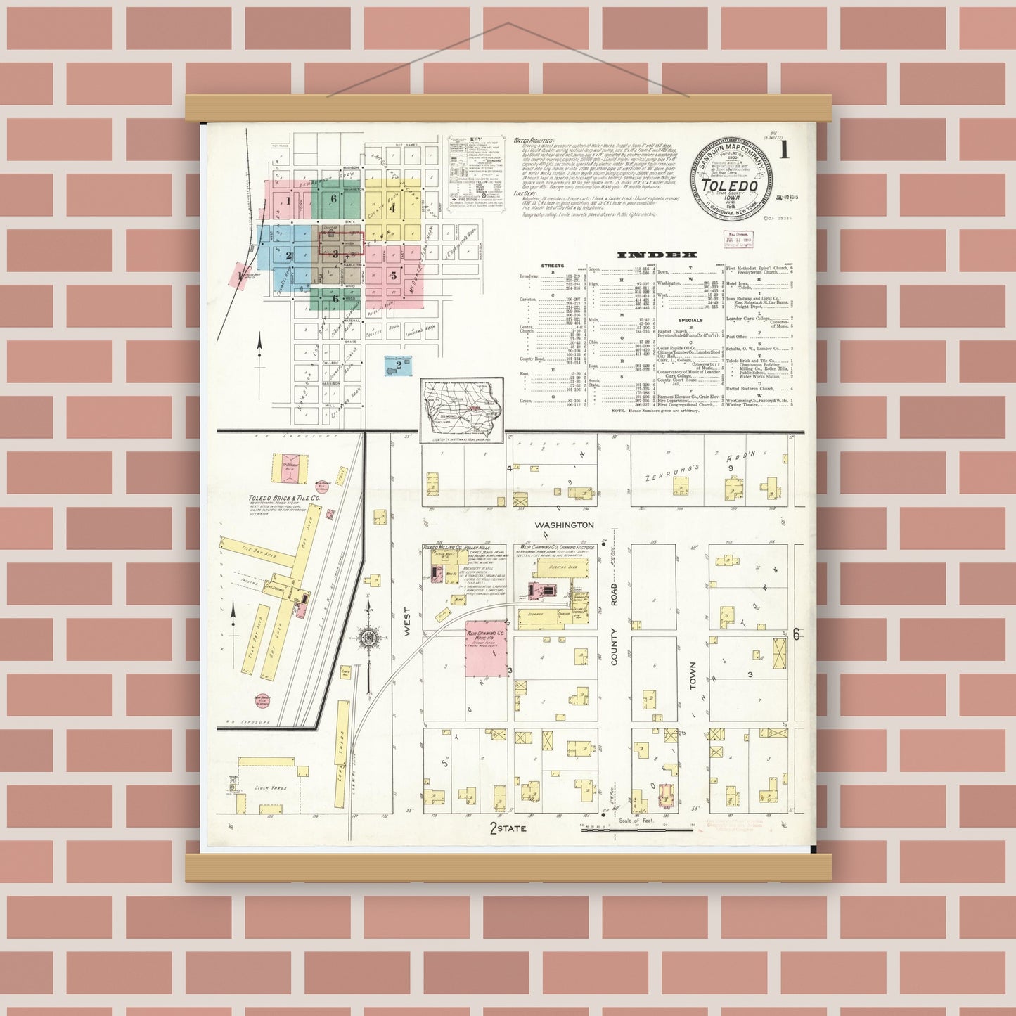 Old map wall art mockup — magnetic wood frame on brick wall — Sanborn Fire Insurance Map from Toledo, Tama County, Iowa (1915), Sheet #0001