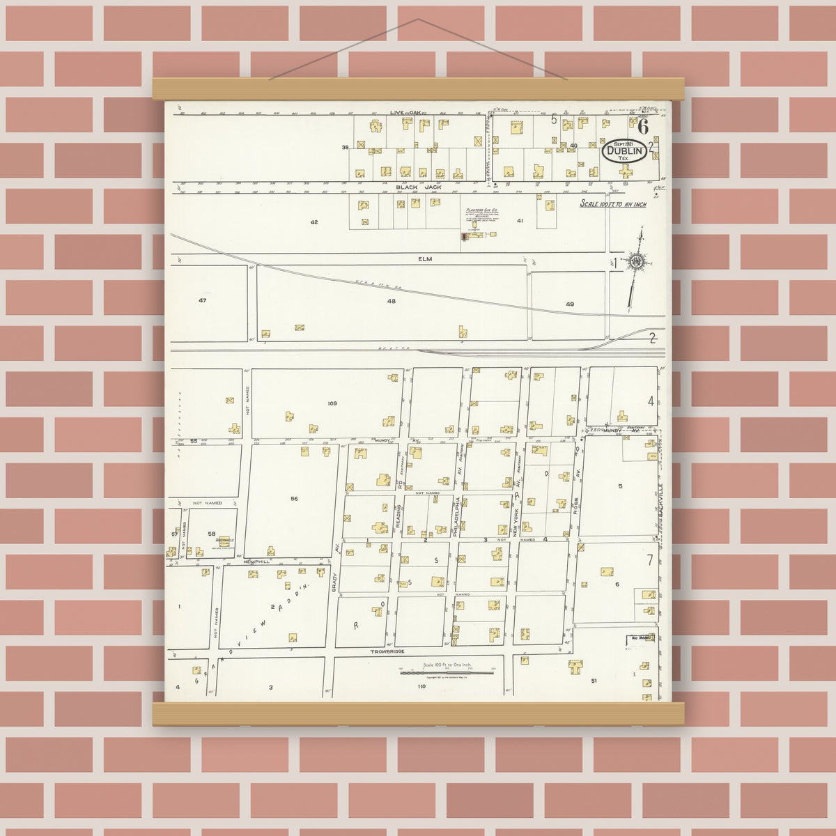 Old map wall art mockup — magnetic wood frame on brick wall — Sanborn Fire Insurance Map from Dublin, Erath County, Texas (1921), Sheet #0006
