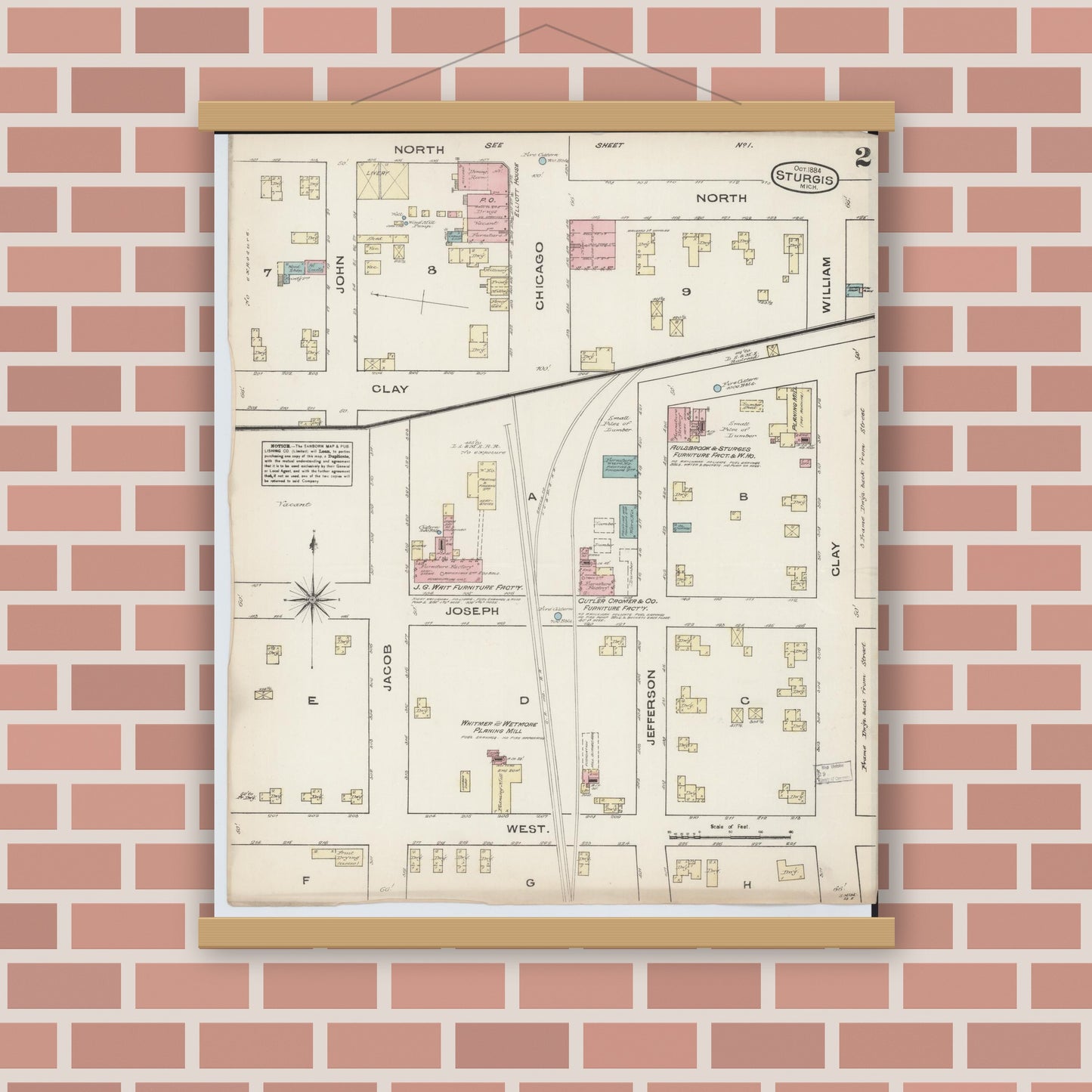 Old map wall art mockup — magnetic wood frame on brick wall — Sanborn Fire Insurance Map from Sturgis, Saint Joseph County, Michigan (1884), Sheet #0002