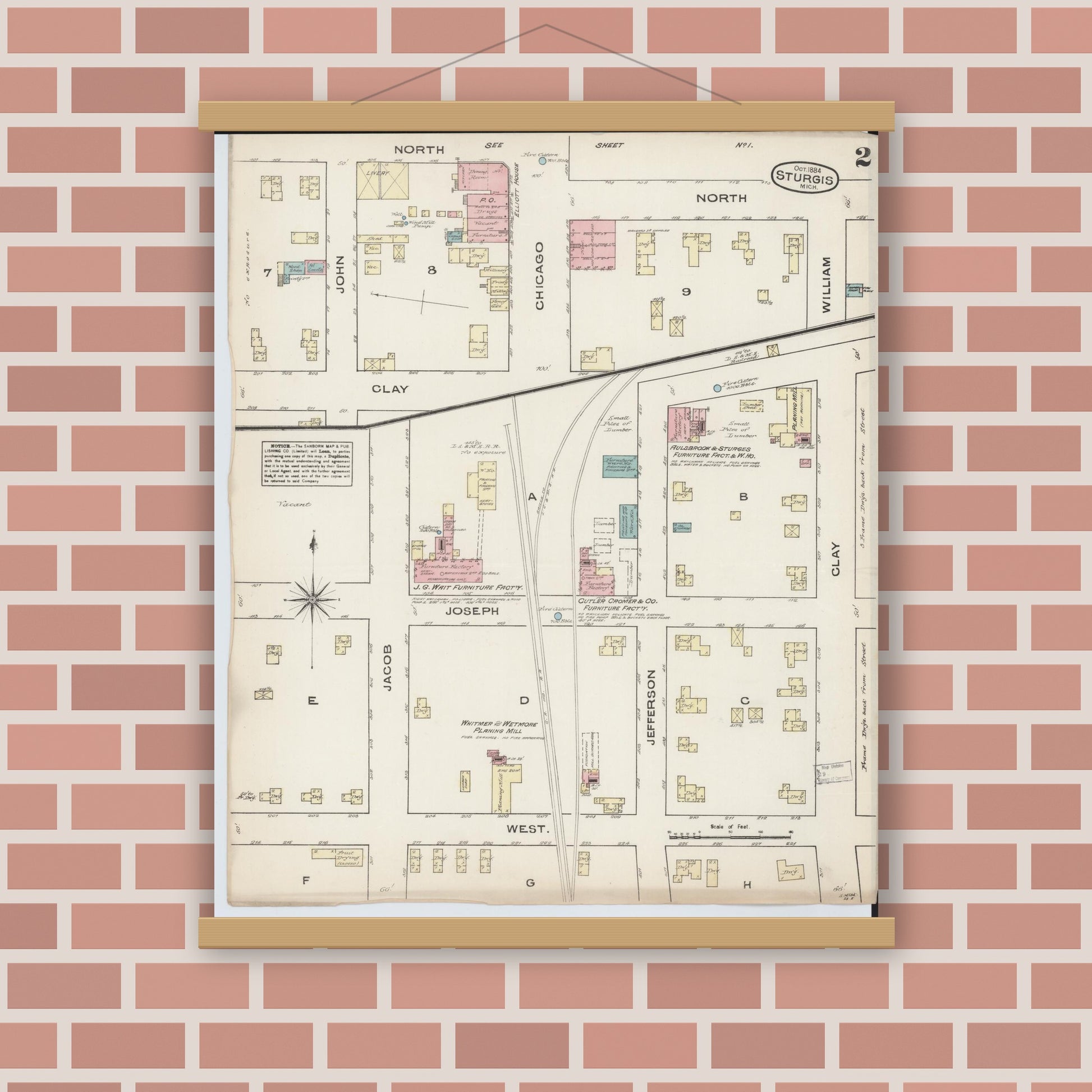 Old map wall art mockup — magnetic wood frame on brick wall — Sanborn Fire Insurance Map from Sturgis, Saint Joseph County, Michigan (1884), Sheet #0002