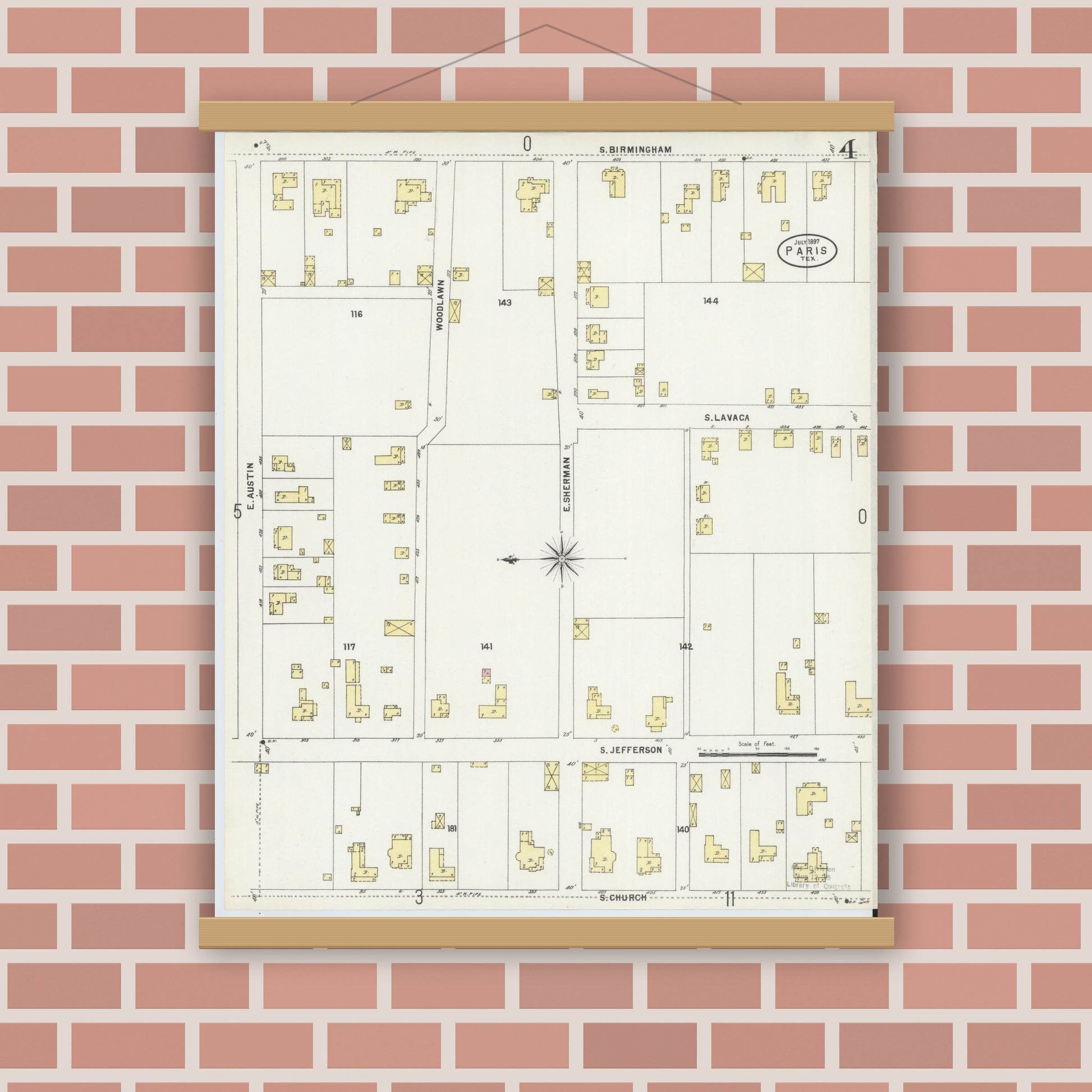 Old map wall art mockup — magnetic wood frame on brick wall — Sanborn Fire Insurance Map from Paris, Lamar County, Texas (1897), Sheet #0004