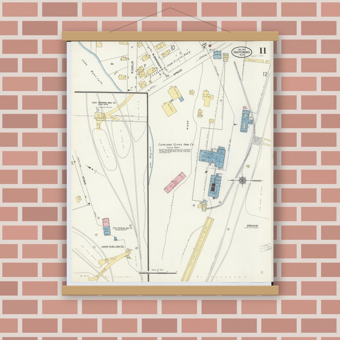 Old map wall art mockup — magnetic wood frame on brick wall — Sanborn Fire Insurance Map from Ishpeming, Marquette County, Michigan (1911), Sheet #0011