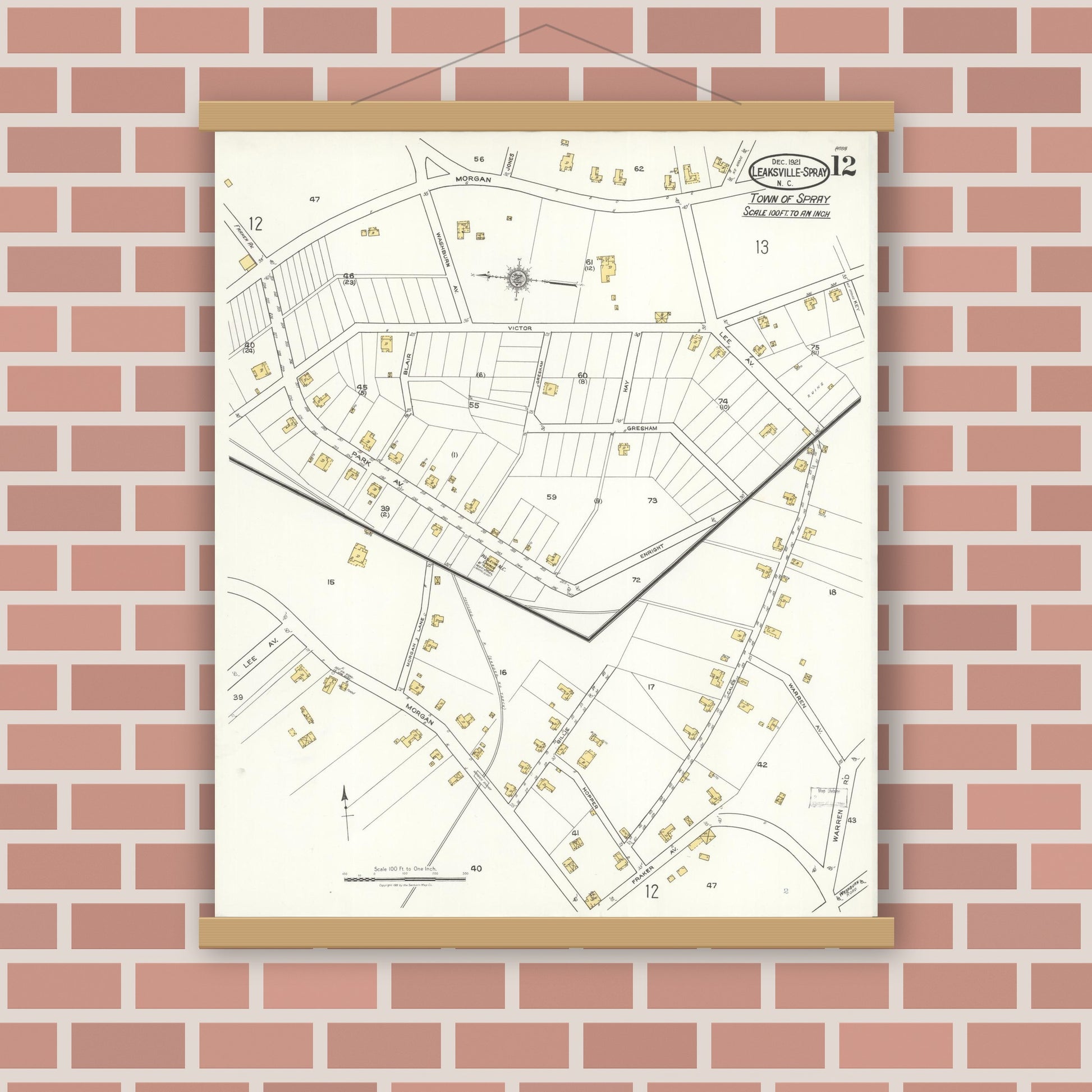 Old map wall art mockup — magnetic wood frame on brick wall — Sanborn Fire Insurance Map from Leaksville-spray, Rockingham County, North Carolina (1921), Sheet #0012