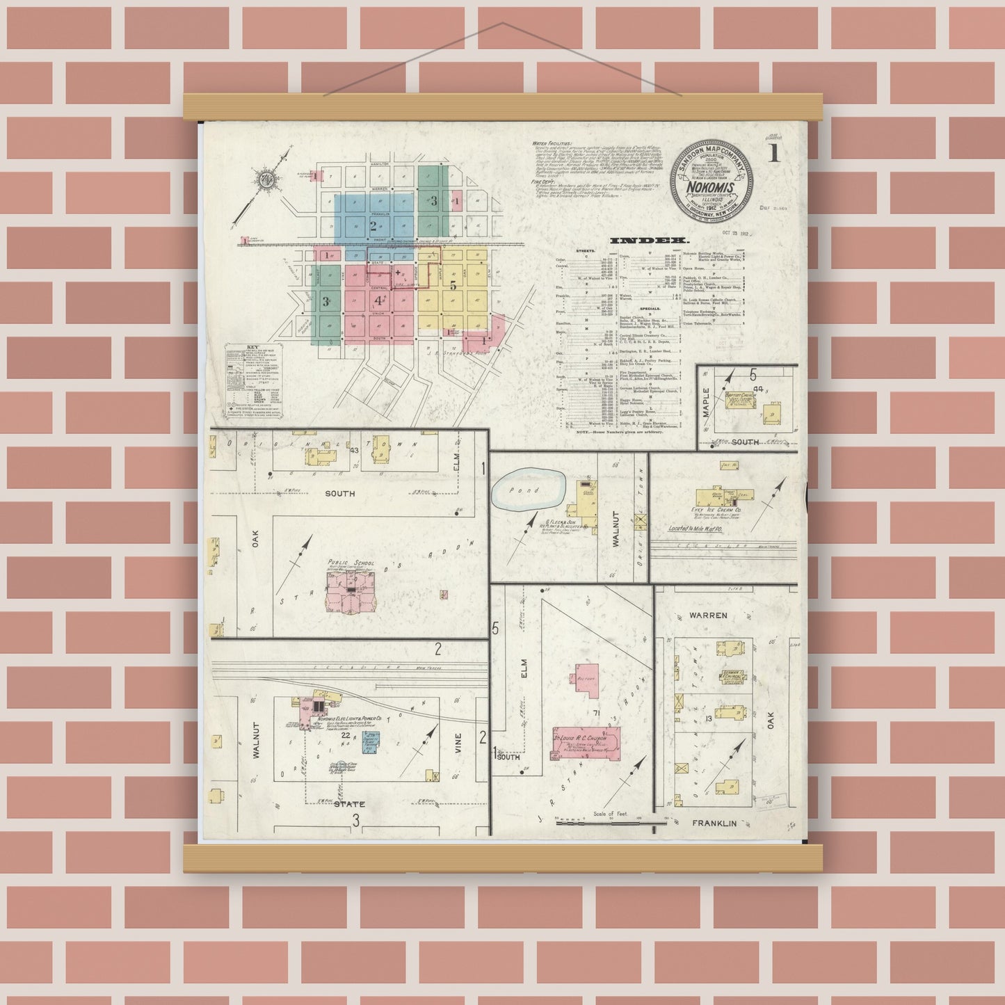 Old map wall art mockup — magnetic wood frame on brick wall — Sanborn Fire Insurance Map from Nokomis, Montgomery County, Illinois (1912), Sheet #0001